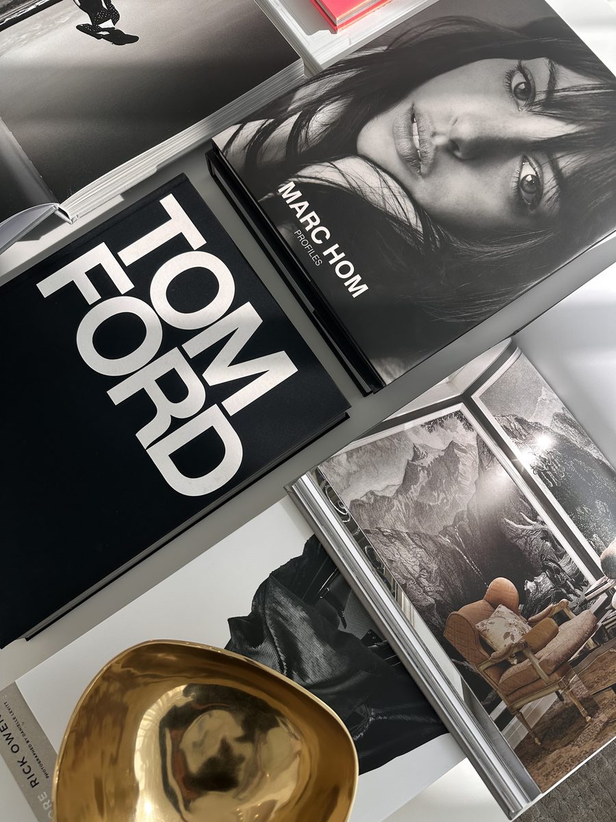 Tom Ford, Marc Hom and travel books flat lay